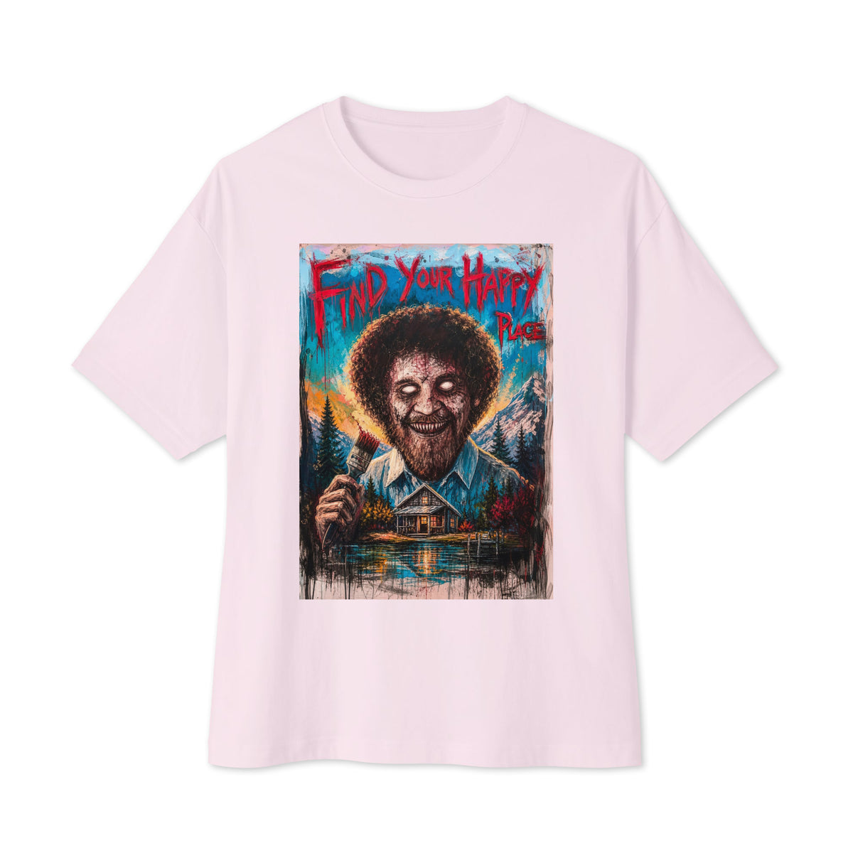 Soft pink oversized boxy tee with the 'Find Your Happy Place' goth graphic: a zombie painter with a curly afro holding a paintbrush in front of a lakeside cabin, with the words "Find your happy place"