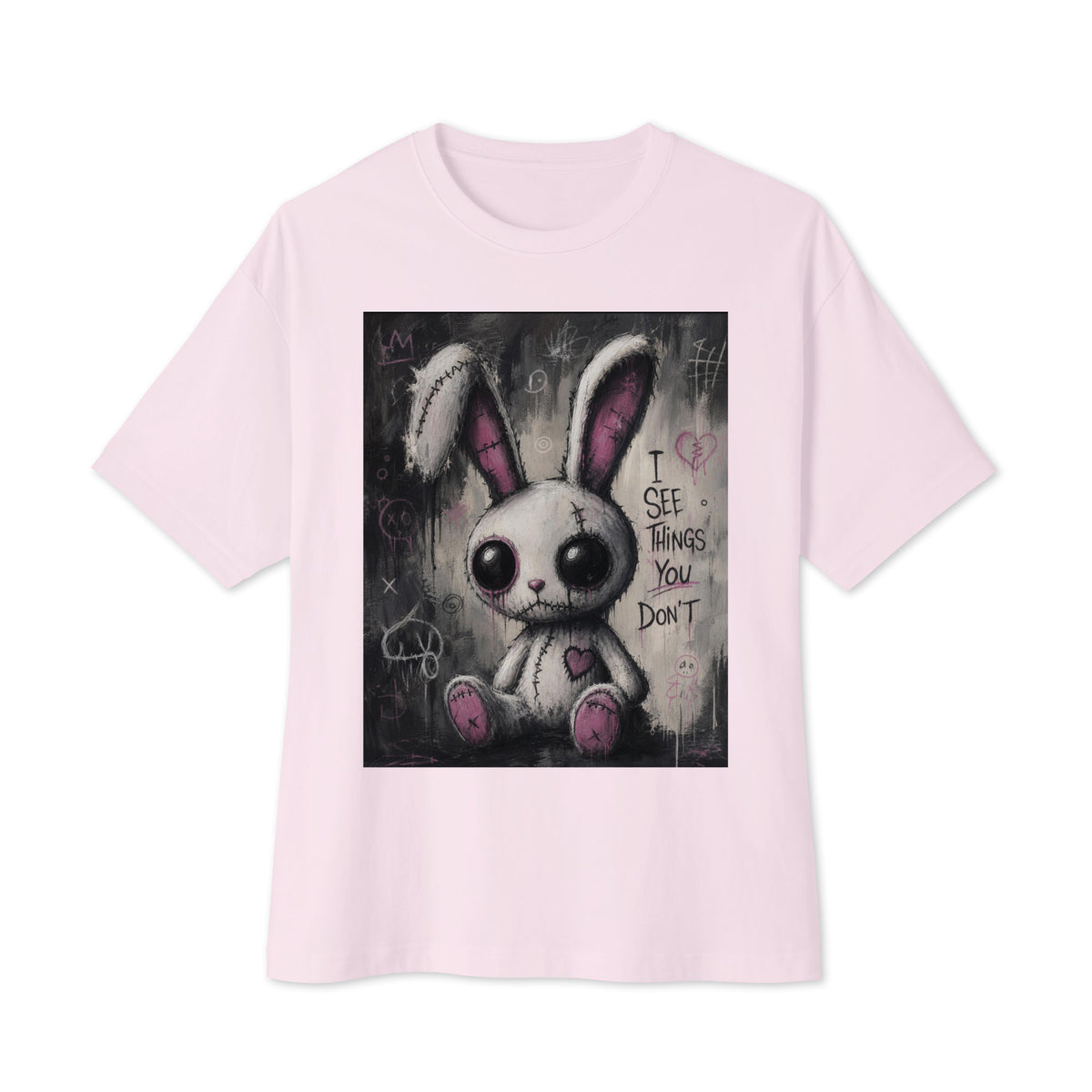 Soft pink oversized boxy tee with the 'I See Things You Don't' goth graphic: a stitched white bunny with hollow eyes, with the words "I see things you don't"