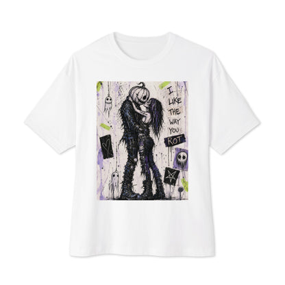 White oversized boxy tee with the 'I Like The Way You Rot' goth graphic: a pumpkin-headed zombie kissing a purple-haired goth girl, with the words "I like the way you rot"