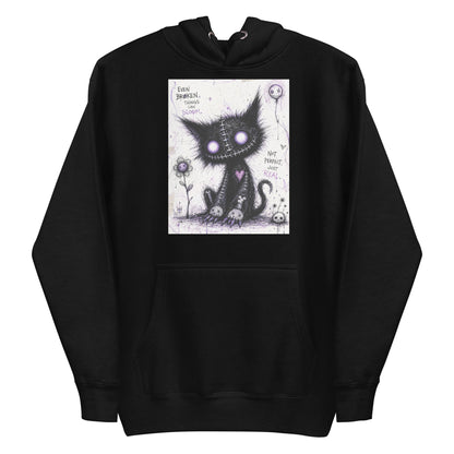 Black pullover hoodie with the 'Even Broken Things Can Bloom' goth graphic: a stitched black cat with glowing purple eyes beside a flower, with the words "Even broken things can bloom"