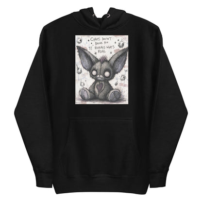 Black pullover hoodie with the 'Chaos' goth graphic: a stitched gray big-eared creature with button eyes, with the words "Chaos doesn't break you, it reveals what's real"