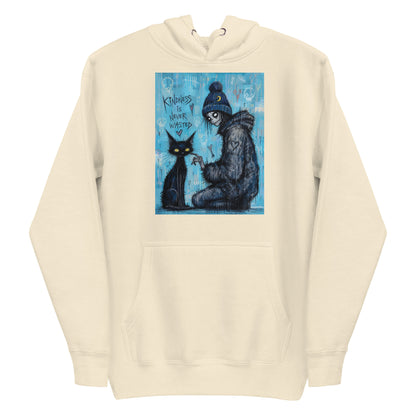 Bone pullover hoodie with the 'Kindness Is Never Wasted' goth graphic: a girl in a moon beanie petting a black cat on a blue background, with the words "Kindness is never wasted"