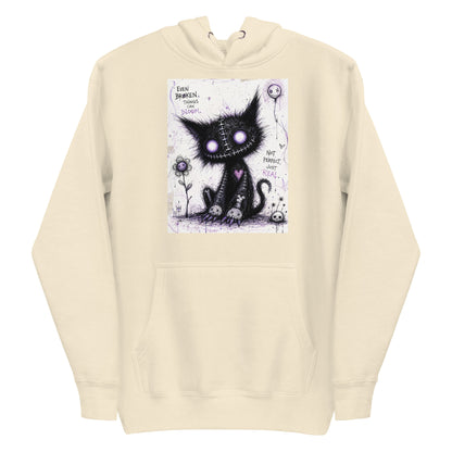 Bone pullover hoodie with the 'Even Broken Things Can Bloom' goth graphic: a stitched black cat with glowing purple eyes beside a flower, with the words "Even broken things can bloom"