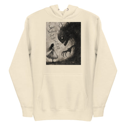 Bone pullover hoodie with the 'Nightmares' goth graphic: a girl in a white dress facing a shadowy clawed monster, with the words "Some nightmares don't leave, they learn your name"