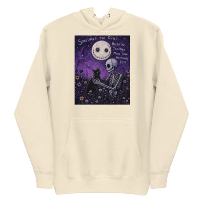 Bone pullover hoodie with the 'The Quiet Heals' goth graphic: a skeleton and a black cat in a purple flower field under a smiling moon, with the words "Sometimes the quiet holds me together more than anything else"