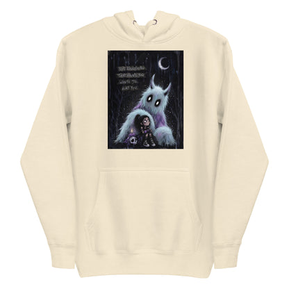 Bone pullover hoodie with the 'The Haunted' goth graphic: a little goth girl holding a candle beside a fuzzy blue monster under a crescent moon, with the words "Not everything that haunts you wants to hurt you"