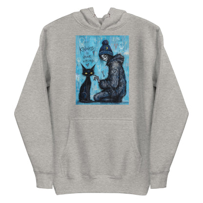 Carbon grey pullover hoodie with the 'Kindness Is Never Wasted' goth graphic: a girl in a moon beanie petting a black cat on a blue background, with the words "Kindness is never wasted"