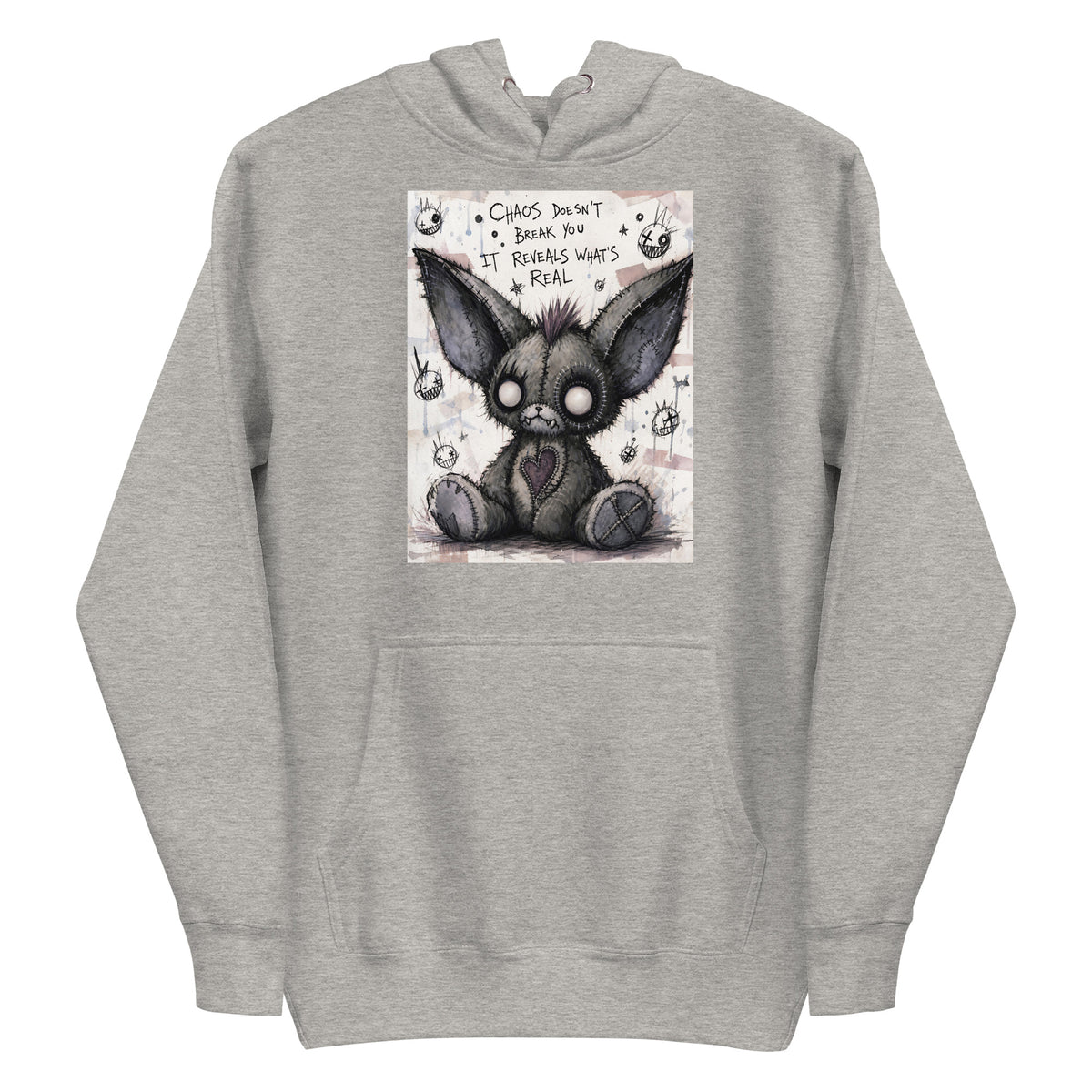 Carbon grey pullover hoodie with the 'Chaos' goth graphic: a stitched gray big-eared creature with button eyes, with the words "Chaos doesn't break you, it reveals what's real"