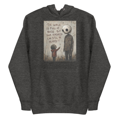 Charcoal heather pullover hoodie with the 'Stay Kind' goth graphic: a tall skull-faced figure and a small child holding a flower, with the words "The world is full of noise, but your kindness can still be heard"