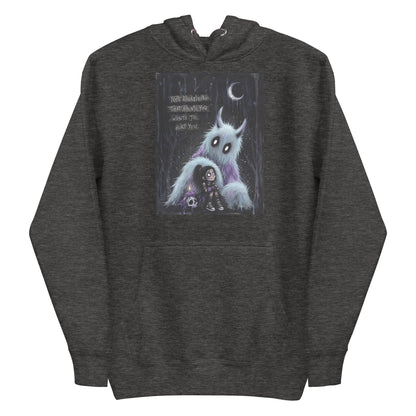 Charcoal heather pullover hoodie with the 'The Haunted' goth graphic: a little goth girl holding a candle beside a fuzzy blue monster under a crescent moon, with the words "Not everything that haunts you wants to hurt you"