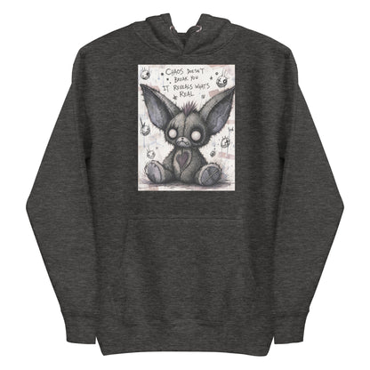 Charcoal heather pullover hoodie with the 'Chaos' goth graphic: a stitched gray big-eared creature with button eyes, with the words "Chaos doesn't break you, it reveals what's real"