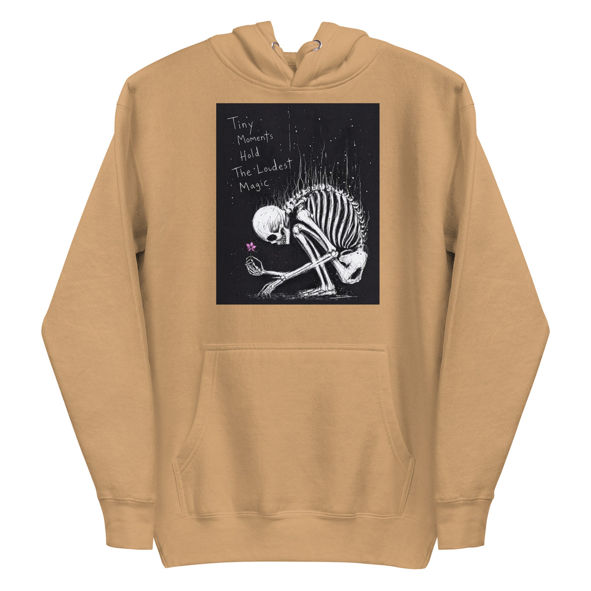 Khaki pullover hoodie with the 'Tiny Moments' goth graphic: a kneeling skeleton holding a tiny pink flower on a black background, with the words "Tiny moments hold the loudest magic"