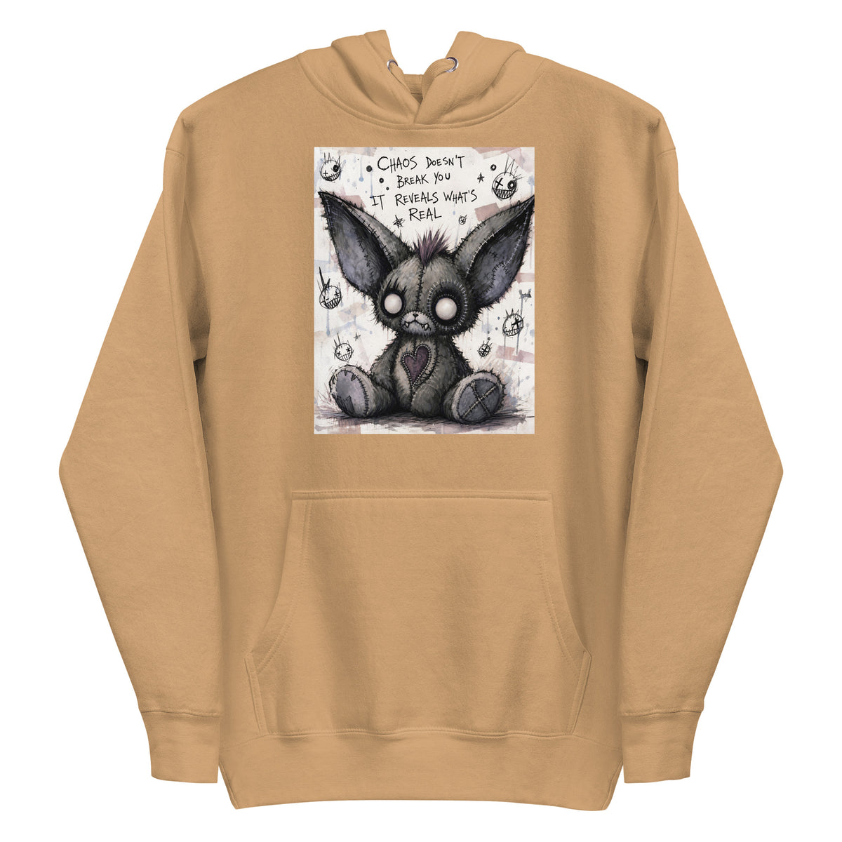 Khaki pullover hoodie with the 'Chaos' goth graphic: a stitched gray big-eared creature with button eyes, with the words "Chaos doesn't break you, it reveals what's real"