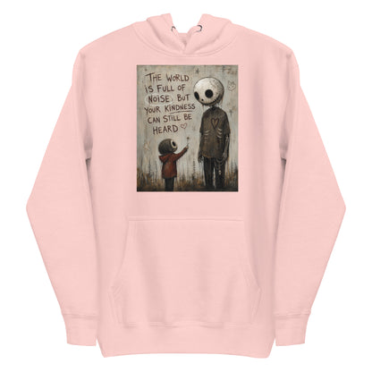 Light pink pullover hoodie with the 'Stay Kind' goth graphic: a tall skull-faced figure and a small child holding a flower, with the words "The world is full of noise, but your kindness can still be heard"