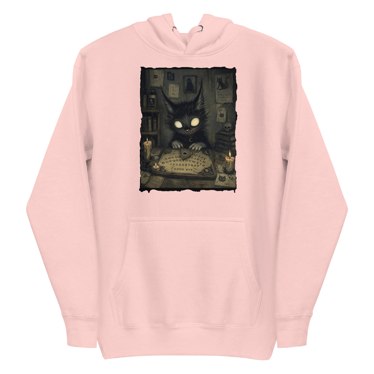Light pink pullover hoodie with the 'Free Readings' goth graphic: a wide-eyed black cat creature at a Ouija board surrounded by candles