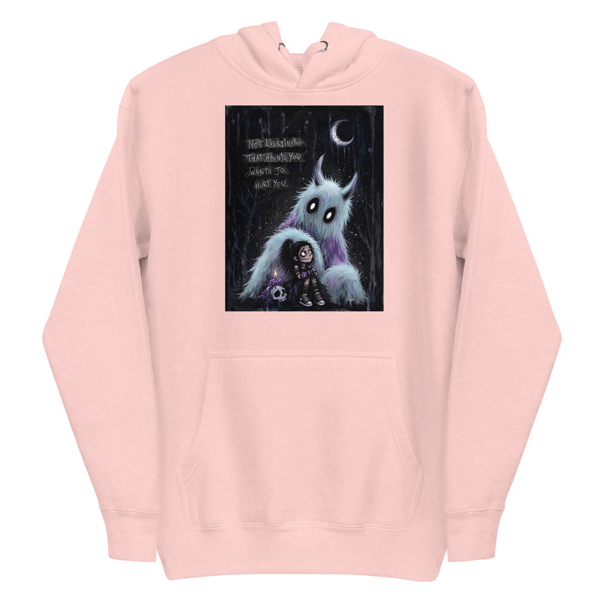 Light pink pullover hoodie with the 'The Haunted' goth graphic: a little goth girl holding a candle beside a fuzzy blue monster under a crescent moon, with the words "Not everything that haunts you wants to hurt you"