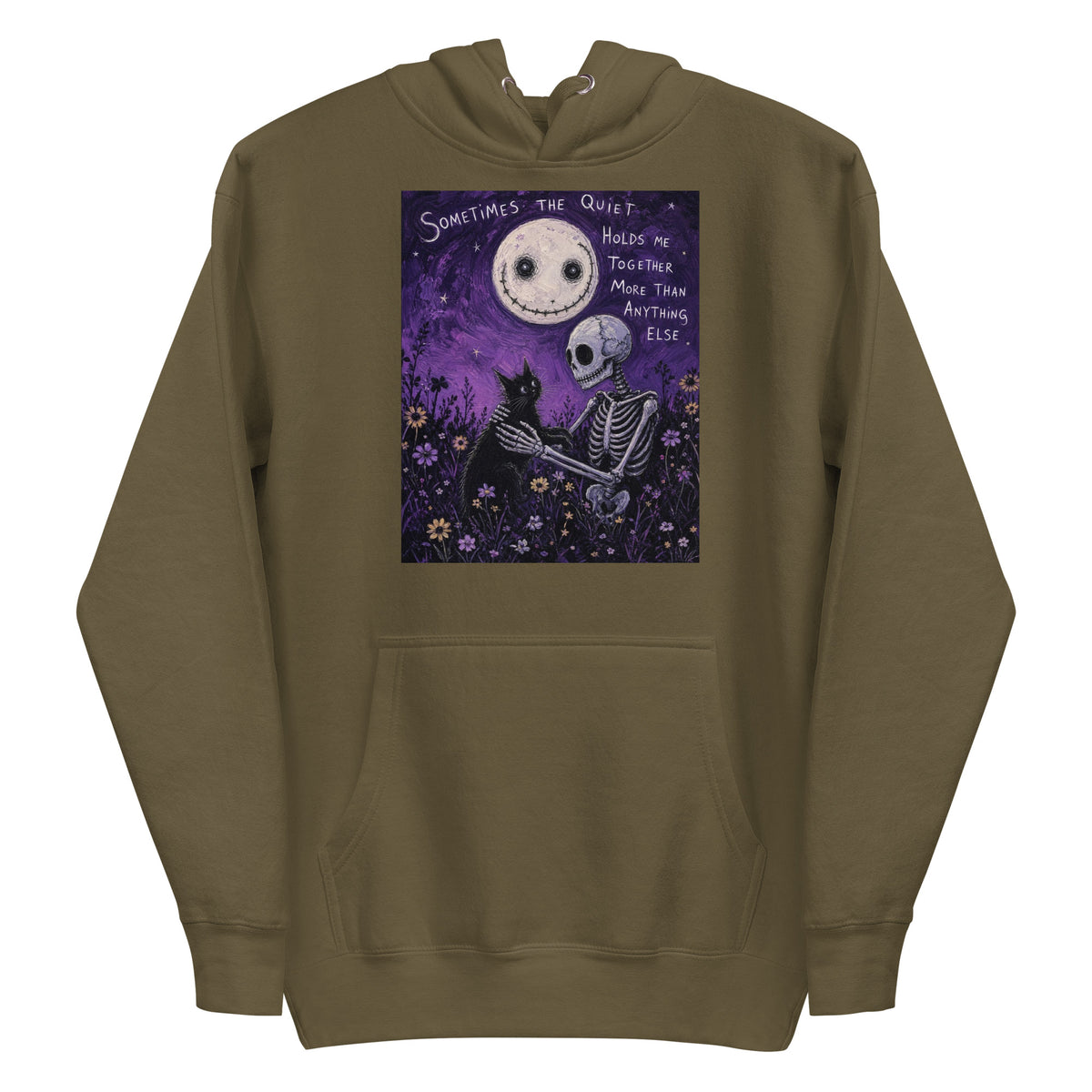 Military green pullover hoodie with the 'The Quiet Heals' goth graphic: a skeleton and a black cat in a purple flower field under a smiling moon, with the words "Sometimes the quiet holds me together more than anything else"