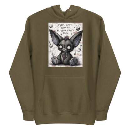 Military green pullover hoodie with the 'Chaos' goth graphic: a stitched gray big-eared creature with button eyes, with the words "Chaos doesn't break you, it reveals what's real"