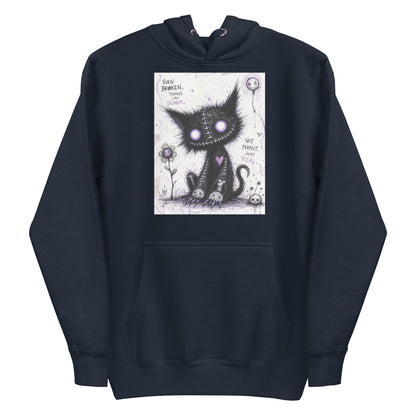 Navy pullover hoodie with the 'Even Broken Things Can Bloom' goth graphic: a stitched black cat with glowing purple eyes beside a flower, with the words "Even broken things can bloom"