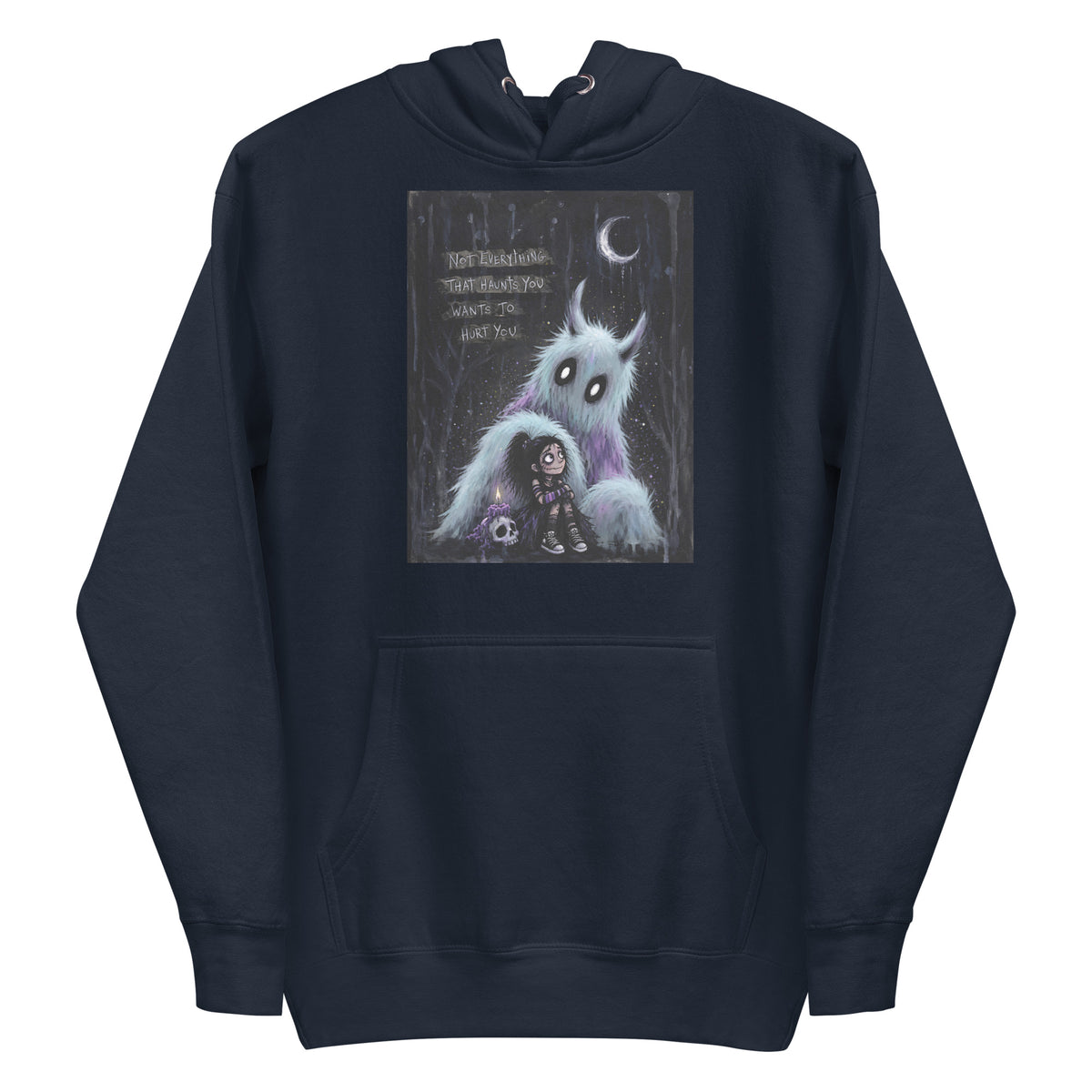 Navy pullover hoodie with the 'The Haunted' goth graphic: a little goth girl holding a candle beside a fuzzy blue monster under a crescent moon, with the words "Not everything that haunts you wants to hurt you"