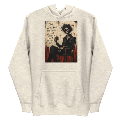 Oatmeal heather pullover hoodie with the 'Truth and Lies' goth graphic: a wild-haired skeleton in a chair holding a mug, with the words "I think we all know the truth, we just decided to call it something else"
