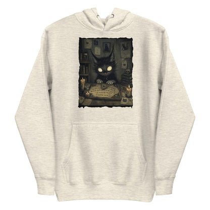 Oatmeal heather pullover hoodie with the 'Free Readings' goth graphic: a wide-eyed black cat creature at a Ouija board surrounded by candles