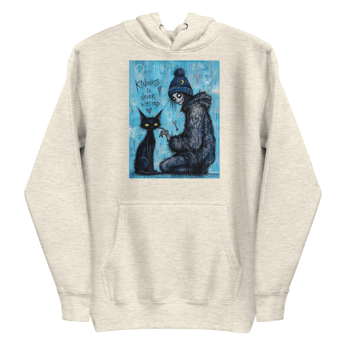 Oatmeal heather pullover hoodie with the 'Kindness Is Never Wasted' goth graphic: a girl in a moon beanie petting a black cat on a blue background, with the words "Kindness is never wasted"