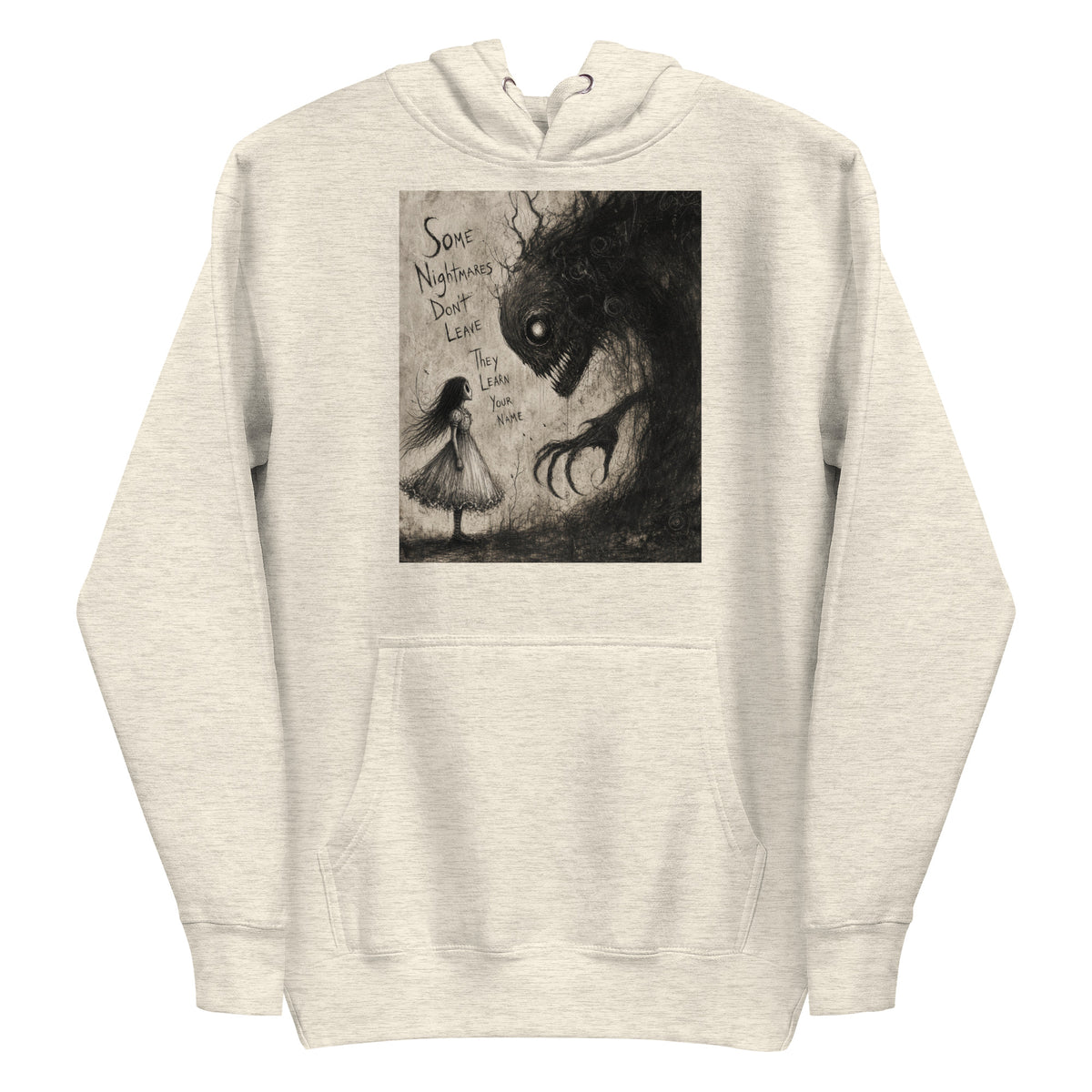 Oatmeal heather pullover hoodie with the 'Nightmares' goth graphic: a girl in a white dress facing a shadowy clawed monster, with the words "Some nightmares don't leave, they learn your name"