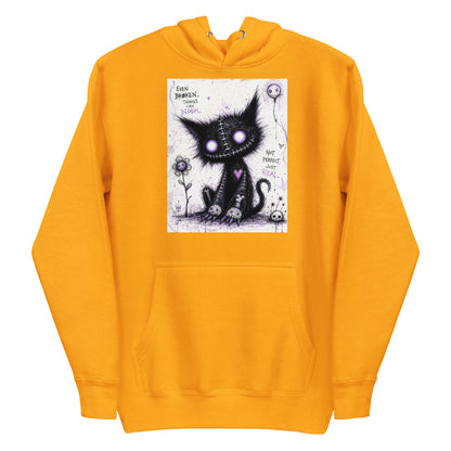 Gold pullover hoodie with the 'Even Broken Things Can Bloom' goth graphic: a stitched black cat with glowing purple eyes beside a flower, with the words "Even broken things can bloom"