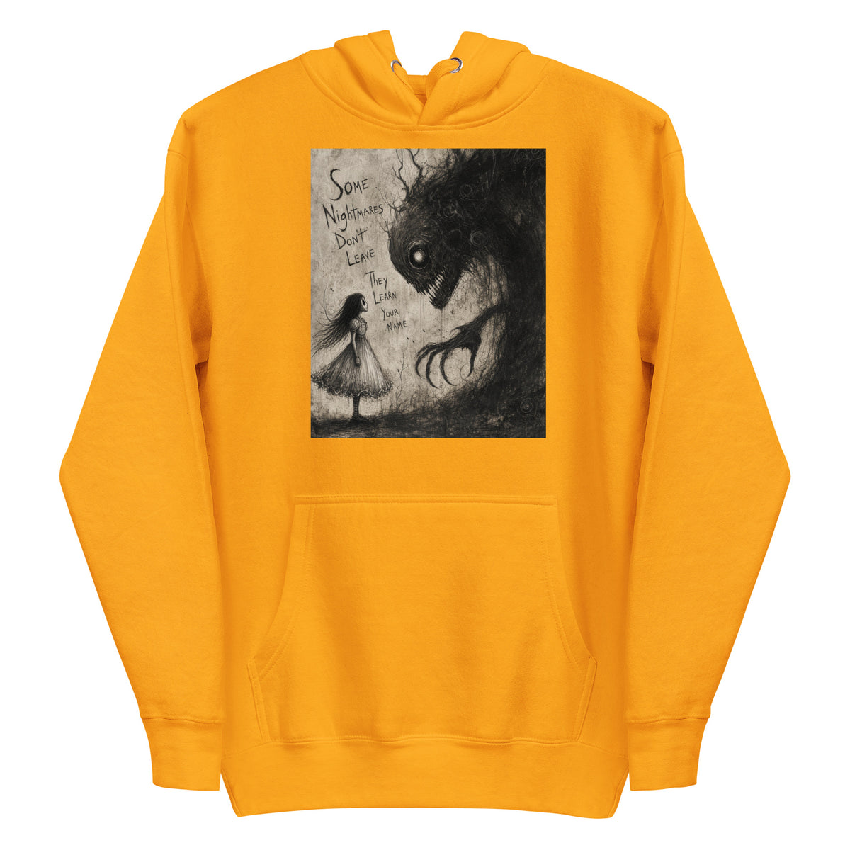 Gold pullover hoodie with the 'Nightmares' goth graphic: a girl in a white dress facing a shadowy clawed monster, with the words "Some nightmares don't leave, they learn your name"