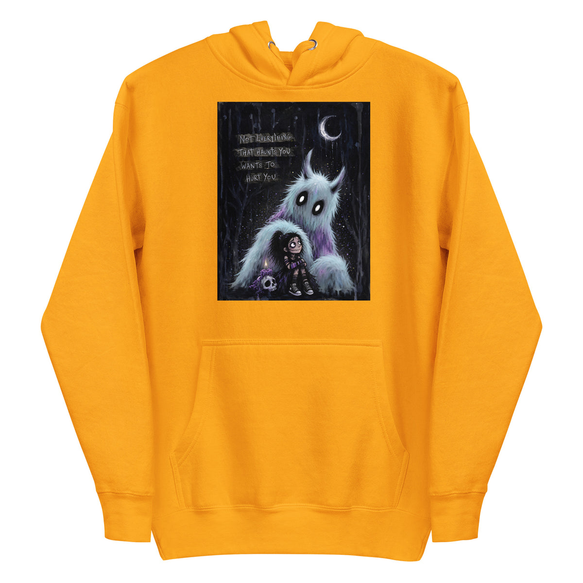 Gold pullover hoodie with the 'The Haunted' goth graphic: a little goth girl holding a candle beside a fuzzy blue monster under a crescent moon, with the words "Not everything that haunts you wants to hurt you"