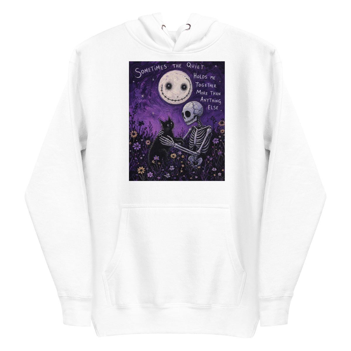 White pullover hoodie with the 'The Quiet Heals' goth graphic: a skeleton and a black cat in a purple flower field under a smiling moon, with the words "Sometimes the quiet holds me together more than anything else"