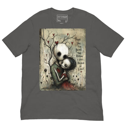 Asphalt unisex t-shirt with the 'My Light In Dark Places' goth graphic: a skull-faced couple embracing under a bare tree with red hearts, with the words "Thank you for being the reason I still believe in light"