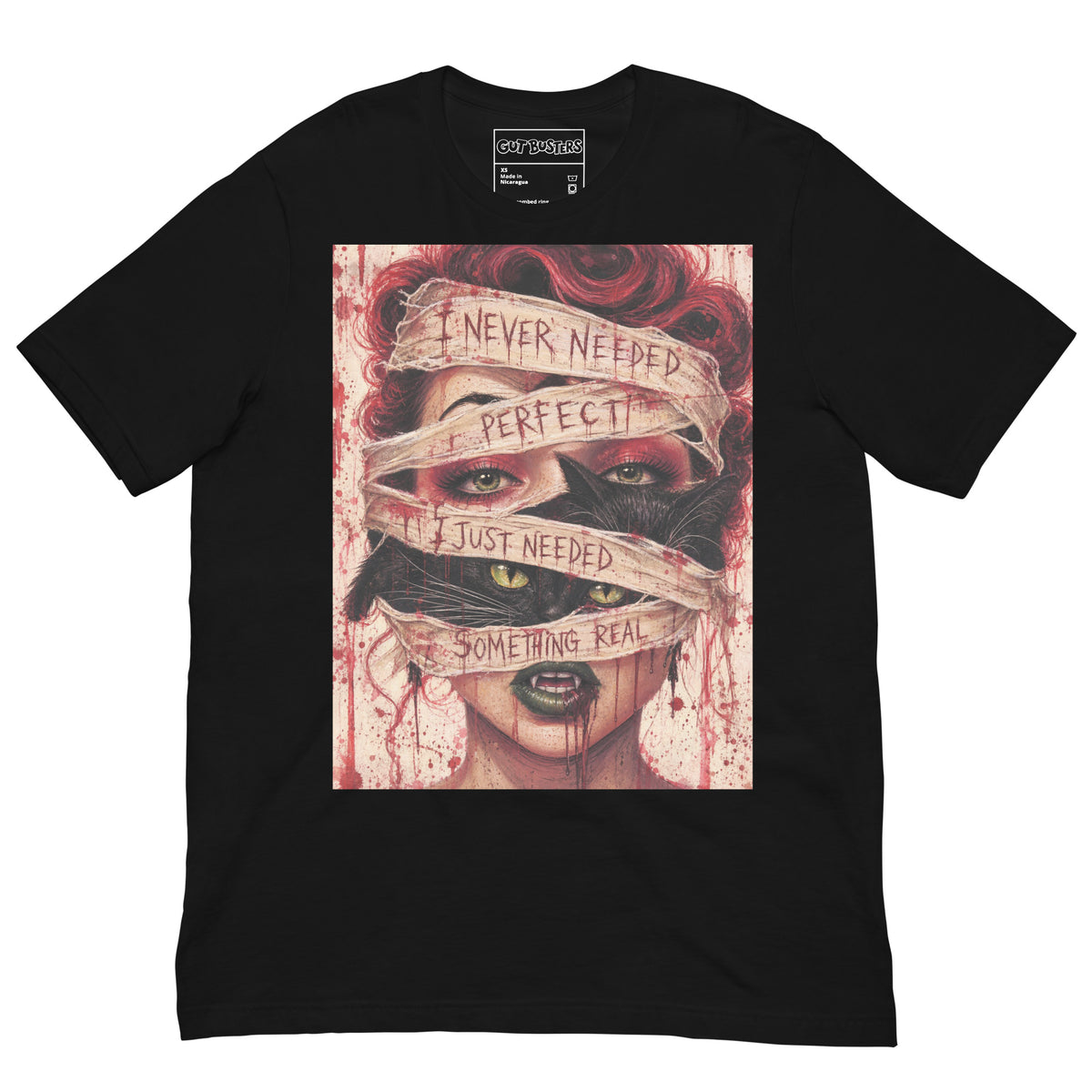 Black unisex t-shirt with the 'Just Something Real' goth graphic: a red-haired woman's face wrapped in bandages, with the words "I never needed perfect, I just needed something real"