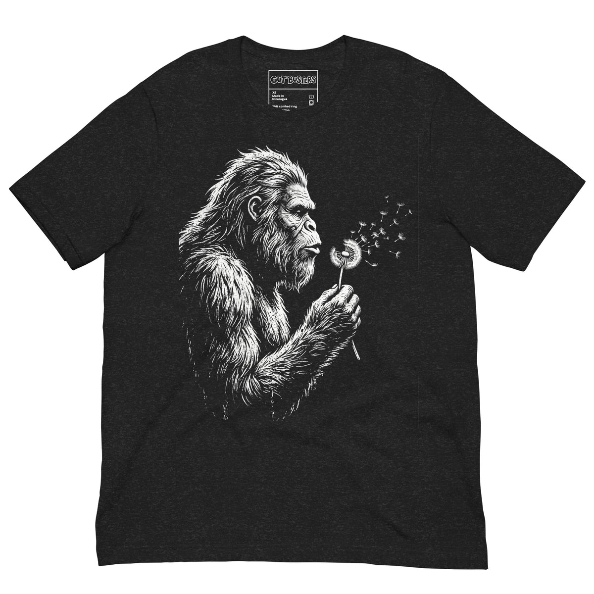 Funny "Bigfoots The Soft Giant" graphic printed on a black heather unisex tee, front view