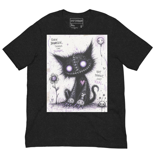 Black heather unisex t-shirt with the 'Even Broken Things Can Bloom' goth graphic: a stitched black cat with glowing purple eyes beside a flower, with the words "Even broken things can bloom"
