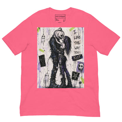 Pink unisex t-shirt with the 'I Like The Way You Rot' goth graphic: a pumpkin-headed zombie kissing a purple-haired goth girl, with the words "I like the way you rot"