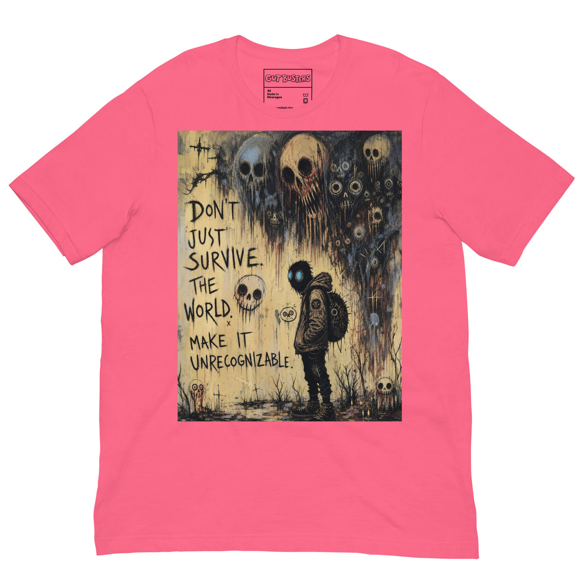 Pink unisex t-shirt with the 'World Changer' goth graphic: a hooded figure beneath looming skulls, with the words "Don't just survive the world, make it unrecognizable"