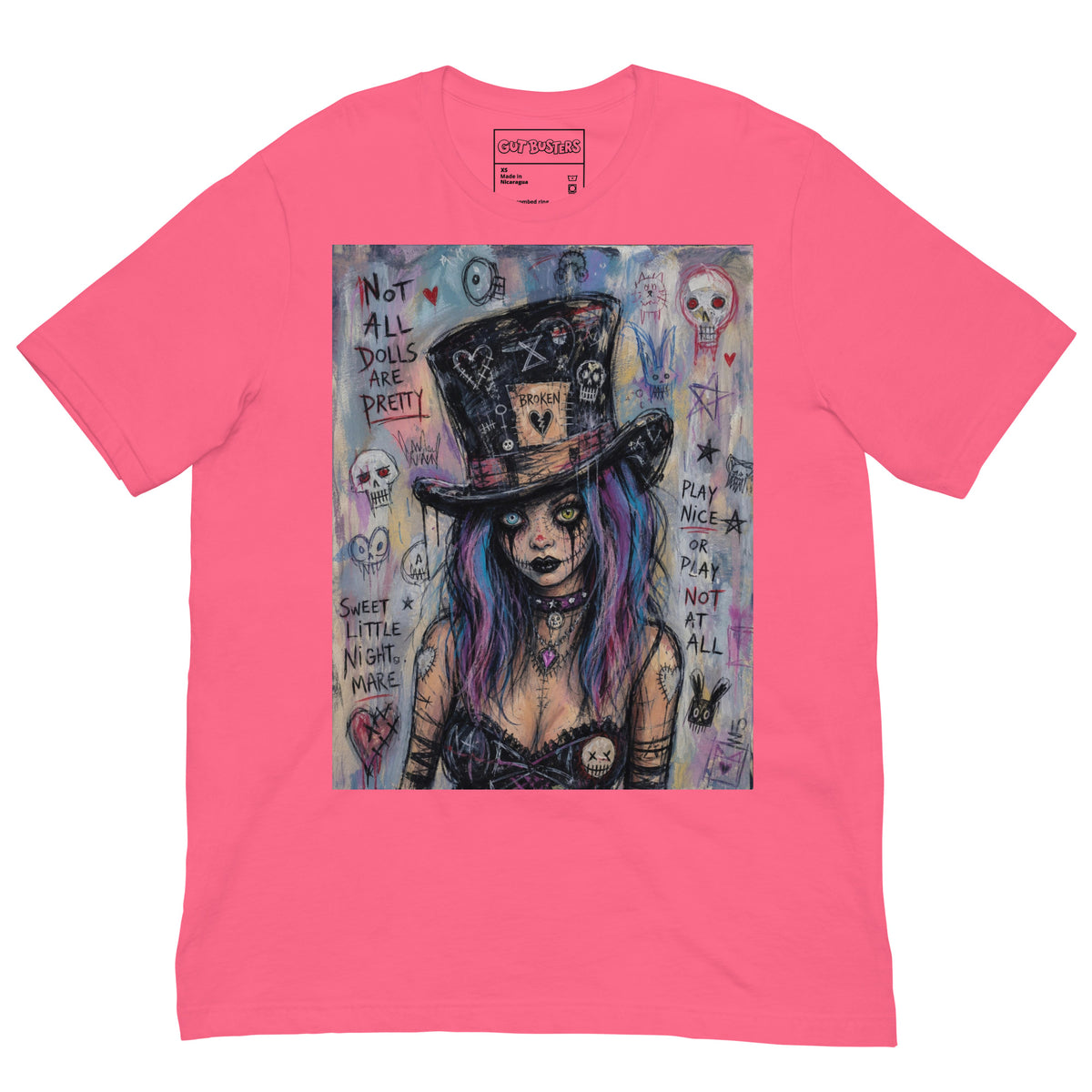 Pink unisex t-shirt with the 'The Real Alice' goth graphic: a goth girl with blue and purple hair in a patched top hat, with the words "Not all dolls are pretty"
