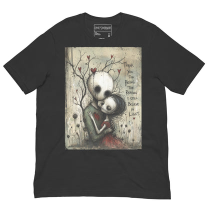 Dark grey unisex t-shirt with the 'My Light In Dark Places' goth graphic: a skull-faced couple embracing under a bare tree with red hearts, with the words "Thank you for being the reason I still believe in light"