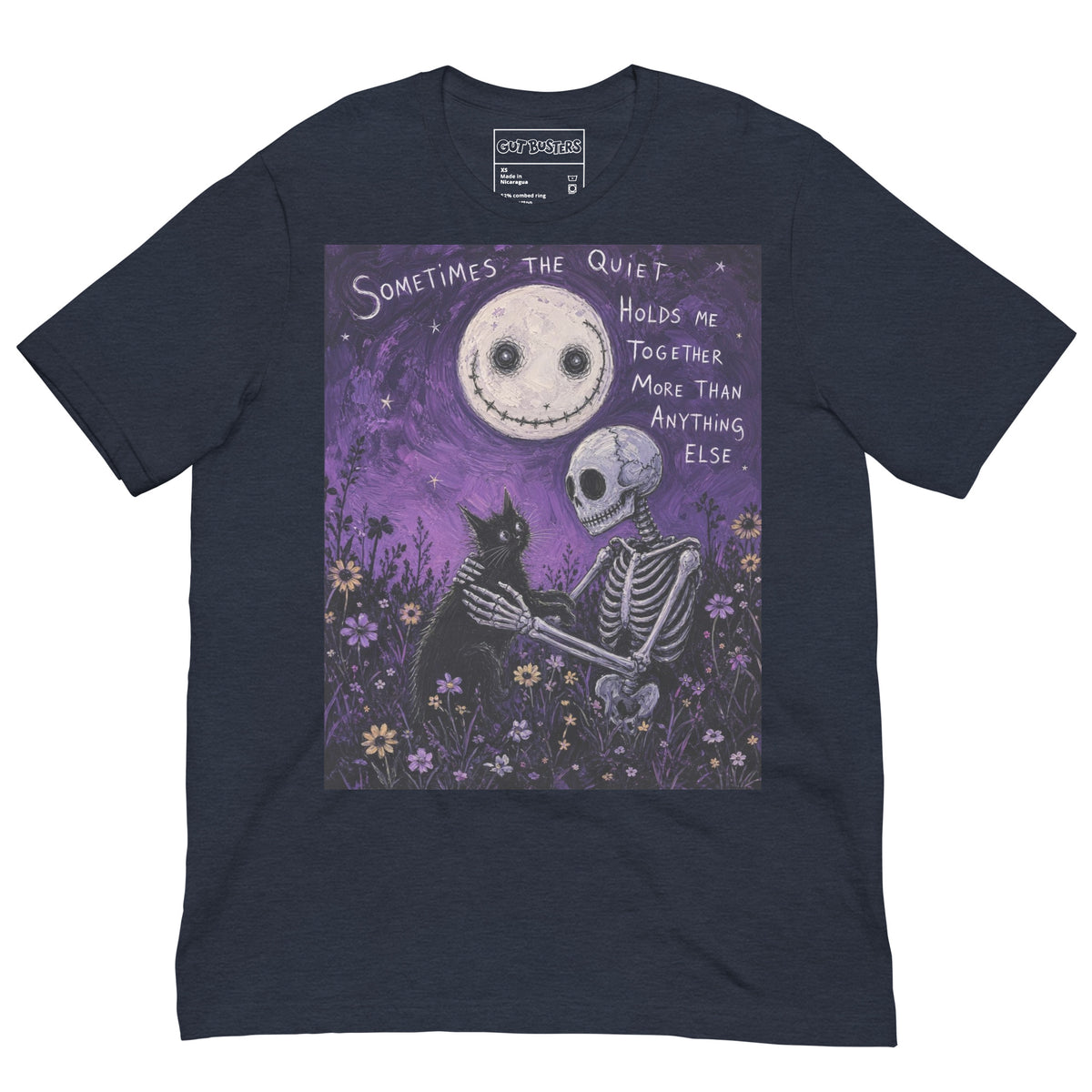 Heather navy unisex t-shirt with the 'The Quiet Heals' goth graphic: a skeleton and a black cat in a purple flower field under a smiling moon, with the words "Sometimes the quiet holds me together more than anything else"