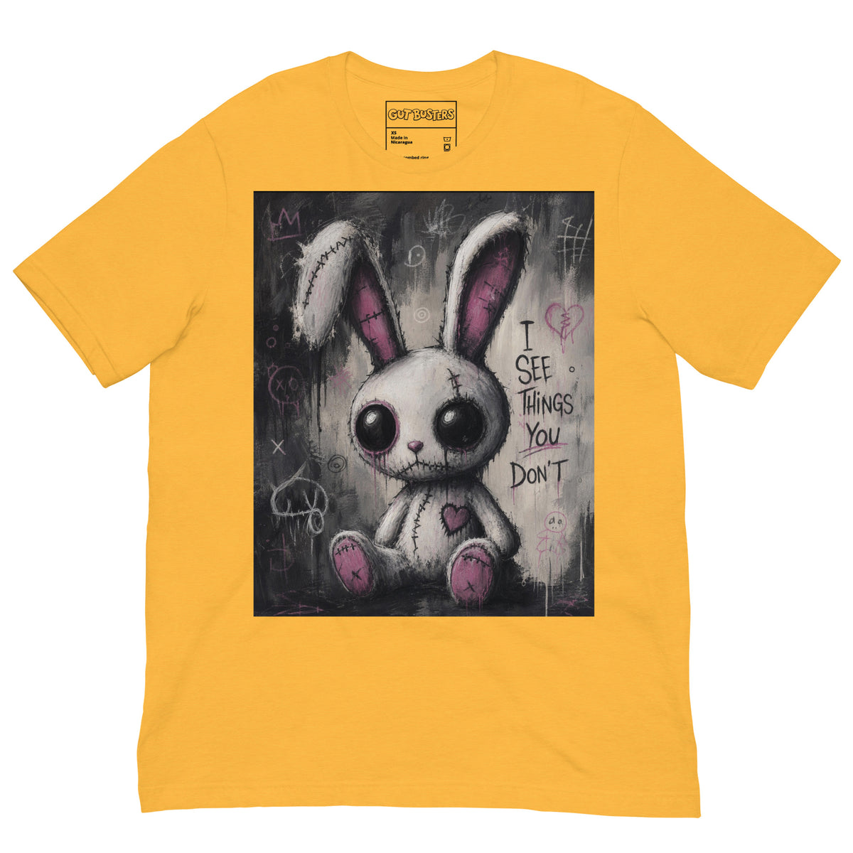 Heather yellow unisex t-shirt with the 'I See Things You Don't' goth graphic: a stitched white bunny with hollow eyes, with the words "I see things you don't"