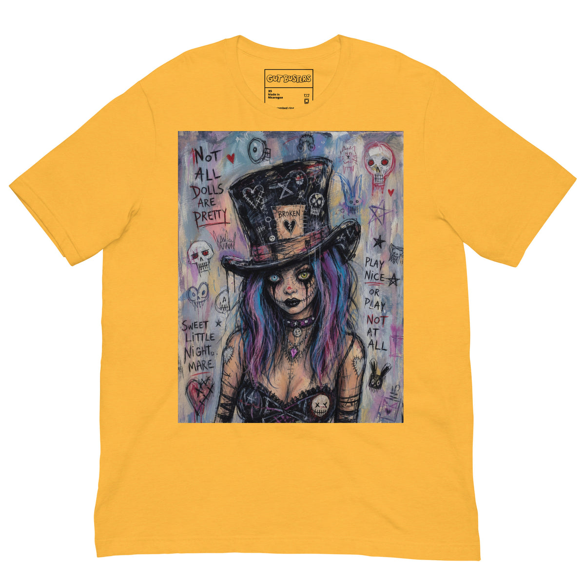 Heather yellow unisex t-shirt with the 'The Real Alice' goth graphic: a goth girl with blue and purple hair in a patched top hat, with the words "Not all dolls are pretty"