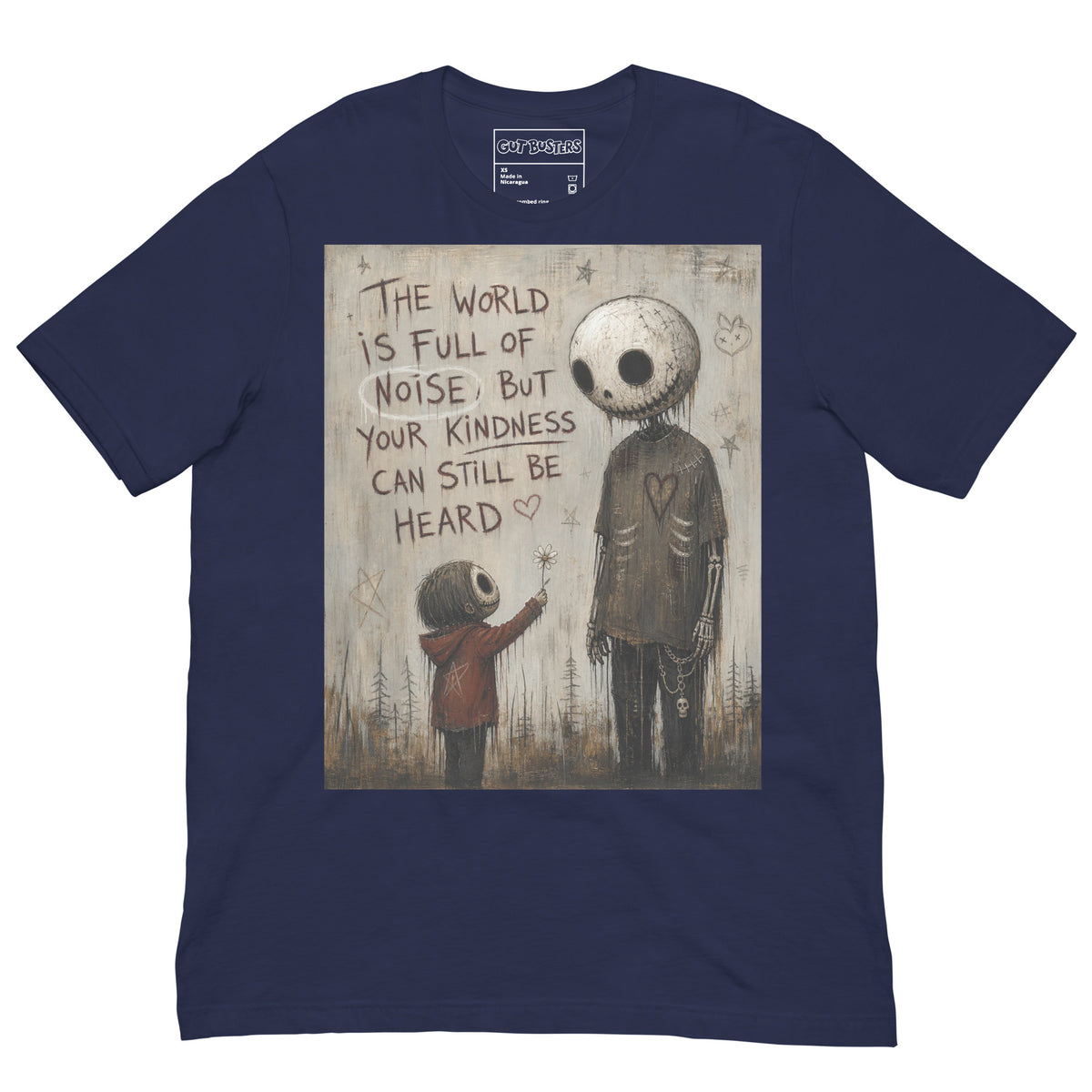 Navy unisex t-shirt with the 'Stay Kind' goth graphic: a tall skull-faced figure and a small child holding a flower, with the words "The world is full of noise, but your kindness can still be heard"