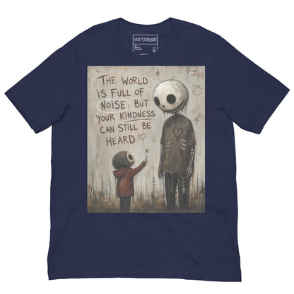 Navy unisex t-shirt with the 'Stay Kind' goth graphic: a tall skull-faced figure and a small child holding a flower, with the words "The world is full of noise, but your kindness can still be heard"
