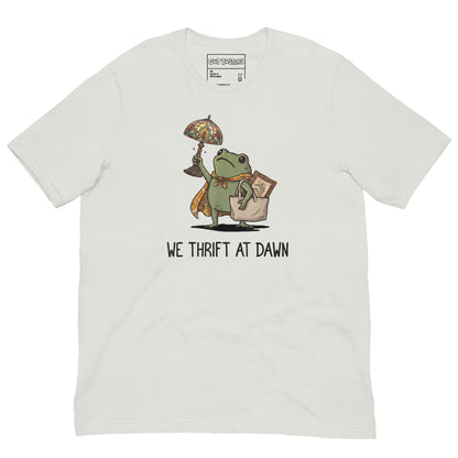 Funny "We Thrift At Dawn Frog" graphic printed on a silver unisex tee, front view