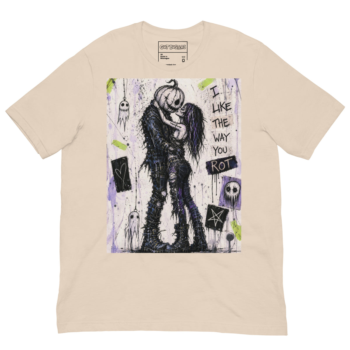 Soft cream unisex t-shirt with the 'I Like The Way You Rot' goth graphic: a pumpkin-headed zombie kissing a purple-haired goth girl, with the words "I like the way you rot"