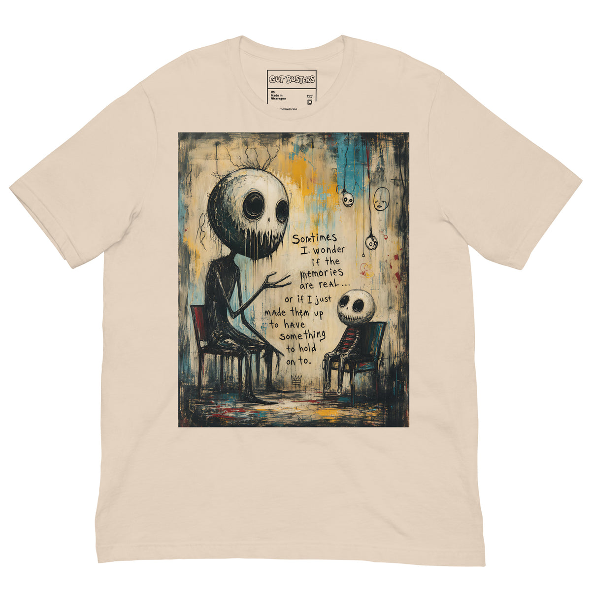 Soft cream unisex t-shirt with the 'Memories' goth graphic: two skull-faced figures sitting in chairs, with the words "Sometimes I wonder if the memories are real"