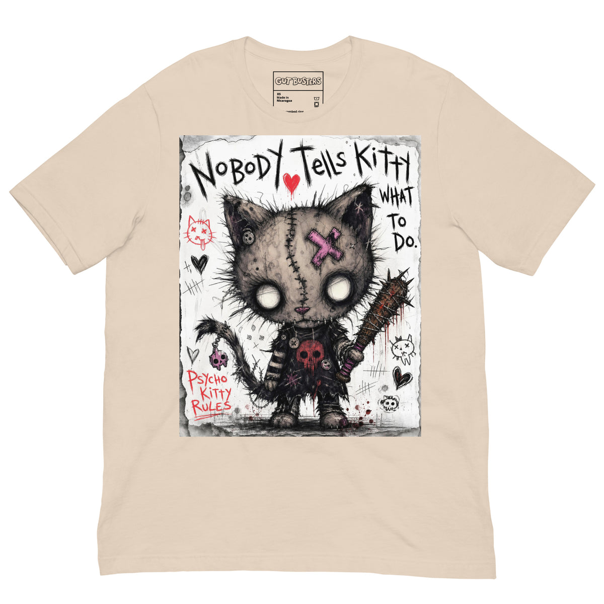 Soft cream unisex t-shirt with the 'Kitty' goth graphic: a stitched zombie cat holding a spiked bat, with the words "Nobody tells Kitty what to do"