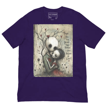Purple unisex t-shirt with the 'My Light In Dark Places' goth graphic: a skull-faced couple embracing under a bare tree with red hearts, with the words "Thank you for being the reason I still believe in light"